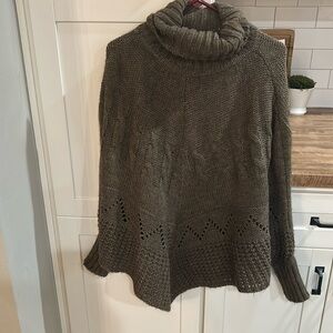 Poncho with sleeves